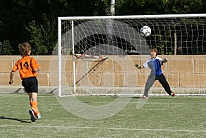 Children playing soccer