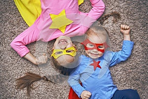 Children are playing superhero