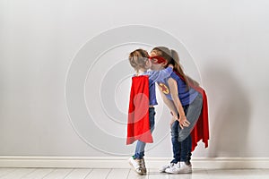 Children are playing superhero