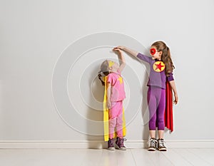 Children are playing superhero