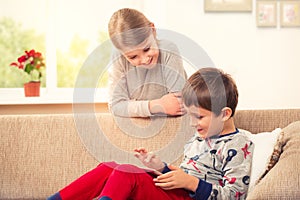 Children playing with tablet pc