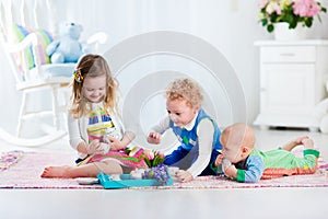 Children playing toy tea party