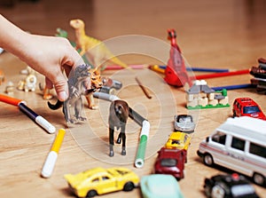 Children playing toys on floor at home, little