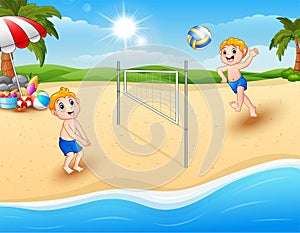Children playing volleyball at the beach