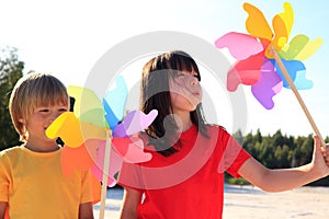 Children playing with windmill