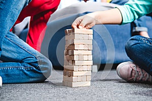 Children playing with wooden blocks