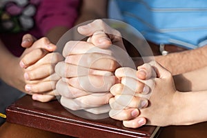 children praying with parent at home, family pray together, online group worship, World Day of Prayer,international day