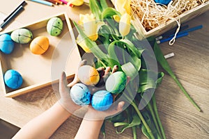 Children prepare for easter. Kids painting easter eggs. Easter background