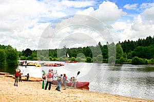 Children preparing for canoes