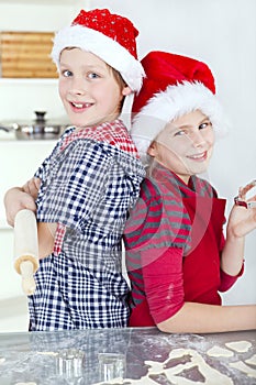 Children preparing christmas cake