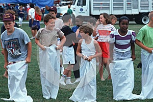 Children preparing for gunny sack race