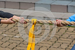 Children pulling rope