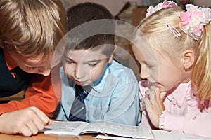 Children reading a book