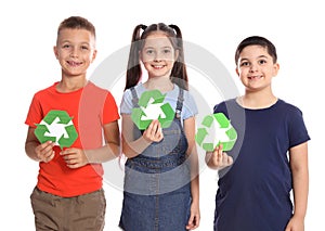 Children with recycling symbols on background