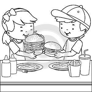 Children at a restaurant eating hamburgers. Vector black and white coloring page