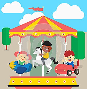 Children ride on the carousel