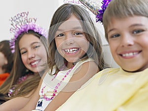 Children In Row At Birthday Party