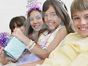 Children In Row At Birthday Party