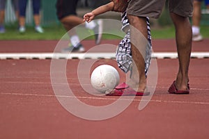 Children running with the ball.