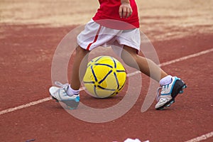 Children running with the ball.