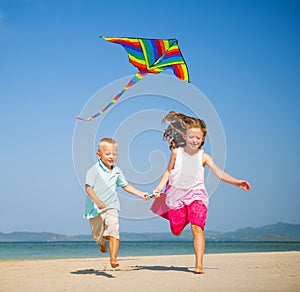 Children running on the beach Concept