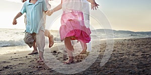 Children running on the beach Concept