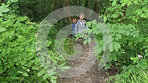 Children running in forest