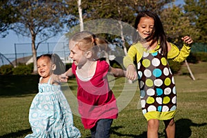 Children running at the park