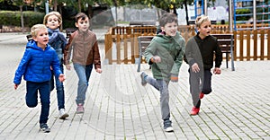 Children running on playground