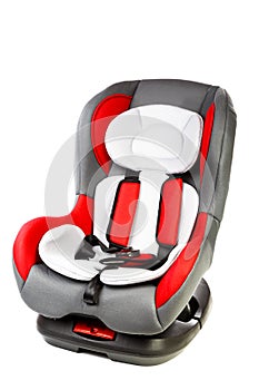 Children's automobile armchair on a white