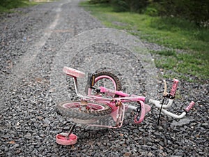 Children`s bicycle stone road. missing children co