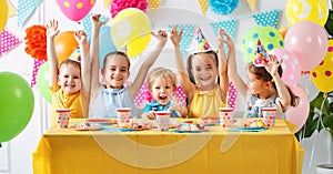 Children`s birthday. happy kids with cake