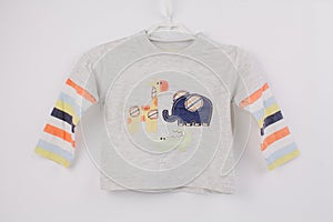 Children`s blouse for baby on a white background