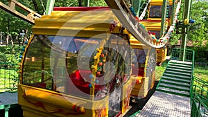 Children`s carousel Ferris wheel in the amusement park of the city of Pyatigorsk