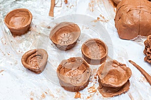 Children`s crafts made of red clay