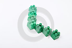 Figures from a colored cubes designer on a white background