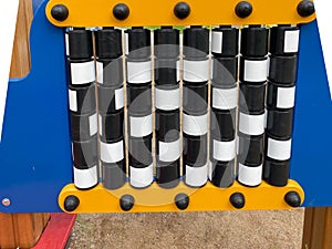 Children`s developmental sports toy on the playground in the open-air courtyard