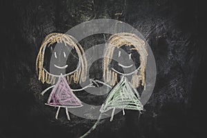 Children`s drawing of two girls.