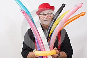 A children`s entertainer doing tricks with balloons