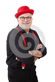 A children`s entertainer with his arms folded