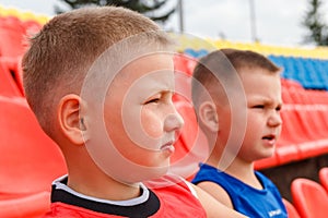 Children`s fans at the football stadium