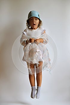 Children`s fashion. A little girl in a stylish outfit.