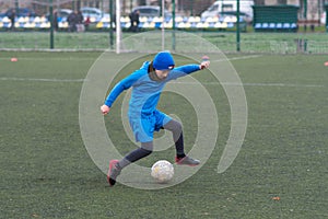 children's football, a boy of European race