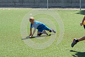 children\'s football, a boy of European race