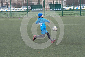 children\'s football, a boy of European race