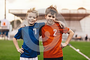 Children's Friendship in Sports Competition. Kids soccer players in school sports tournaments