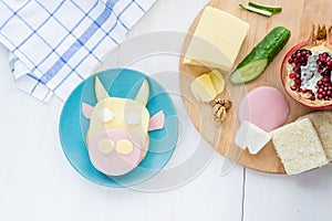 Children`s fun food.Sandwich in the form of a cow for kids breakfast.Step-by-step recipe for cooking dishes for menu