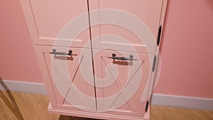 Children`s furniture closet shelves drawers storage interior pink box