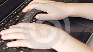 Children`s hand prints on the keyboard