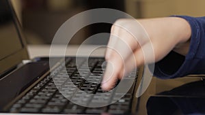 Children`s hand prints on the keyboard